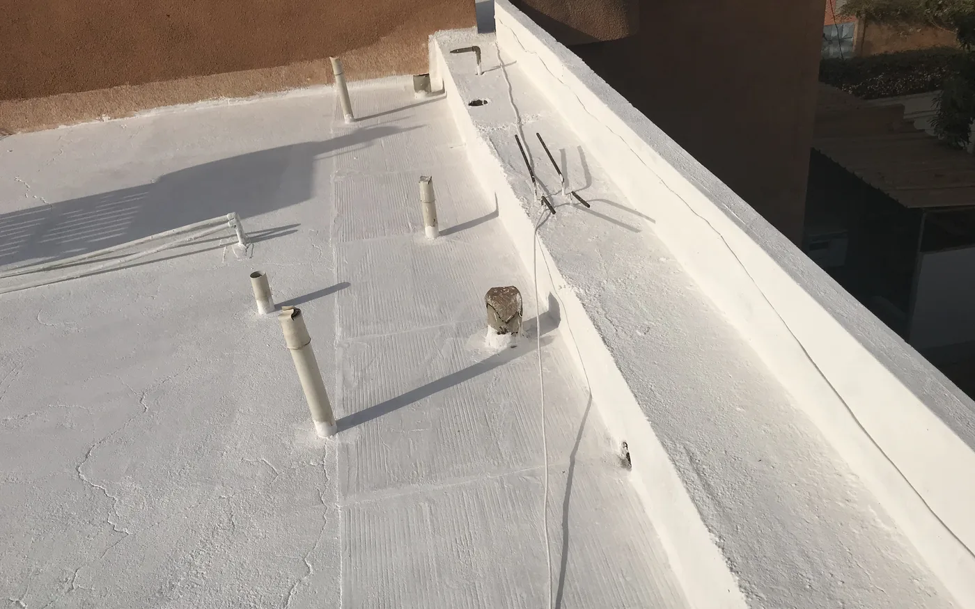 Finished terrace, continuous white membrane